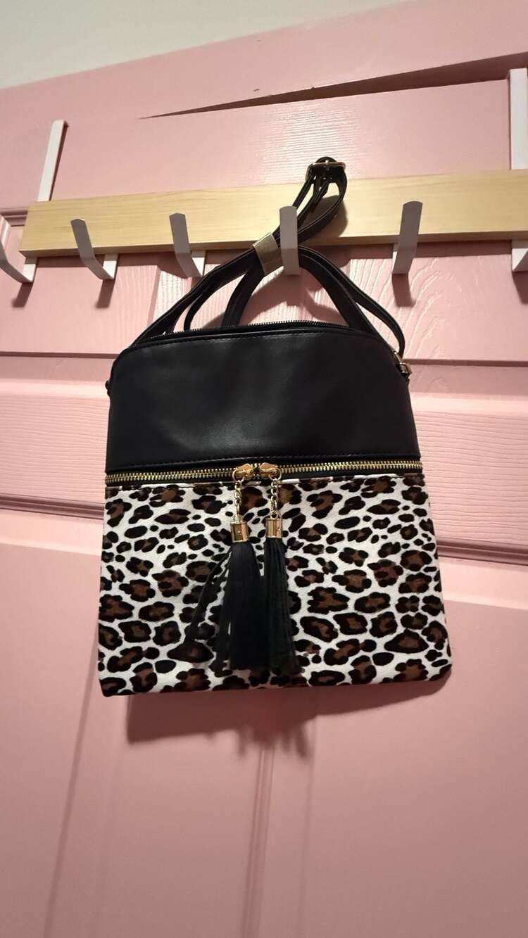 Zenana Leopard Print and Black Faux Leather Crossbody Bag with Tassel Accents
